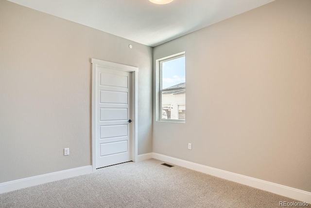 2404 W 69th Pl, Denver, CO 80221 - empty room with light colored carpet and baseboards