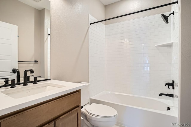2404 W 69th Pl, Denver, CO 80221 - full bathroom featuring vanity, bathing tub / shower combination, and a textured wall
