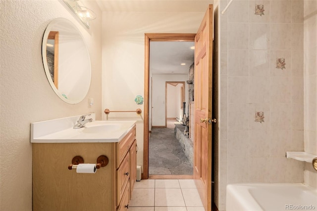 3581 Gap Rd, Golden, CO 80403 - bathroom with vanity, tile patterned flooring, and bathing tub / shower combination