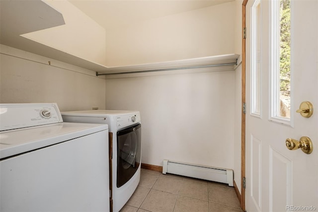 3581 Gap Rd, Golden, CO 80403 - laundry room with baseboard heating, washer and clothes dryer, light tile patterned floors, and baseboards