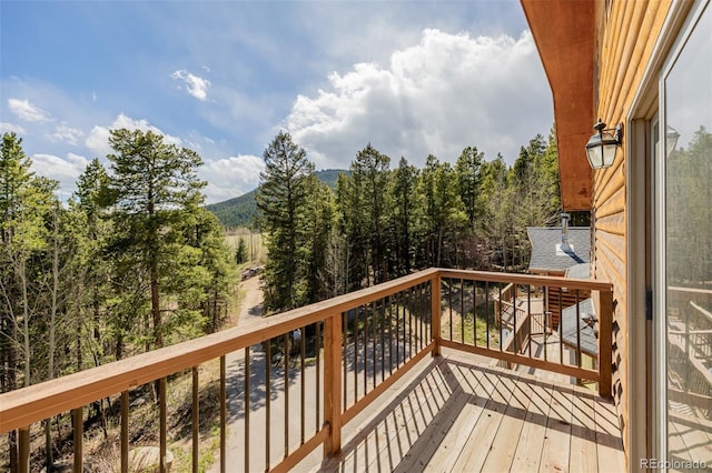 3581 Gap Rd, Golden, CO 80403 - wooden terrace featuring a mountain view