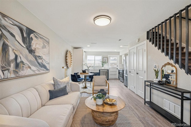 living room with light wood-type flooring