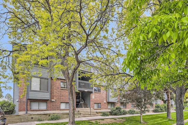 3558 S Depew St Unit 302, Denver, CO 80235 - view of building exterior with stairway