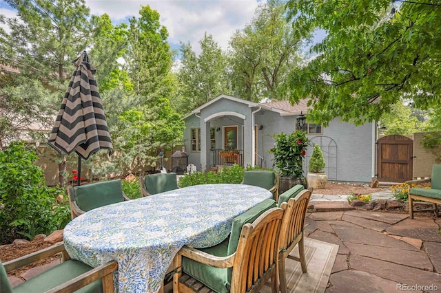 1502 Columbine Ave, Boulder, CO 80302 - view of patio / terrace with a gate and outdoor dining space