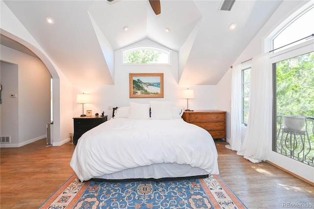 1502 Columbine Ave, Boulder, CO 80302 - bedroom featuring wood finished floors, vaulted ceiling, arched walkways, baseboards, and access to outside