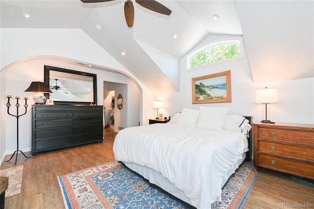 1502 Columbine Ave, Boulder, CO 80302 - bedroom with vaulted ceiling, arched walkways, wood finished floors, and a ceiling fan