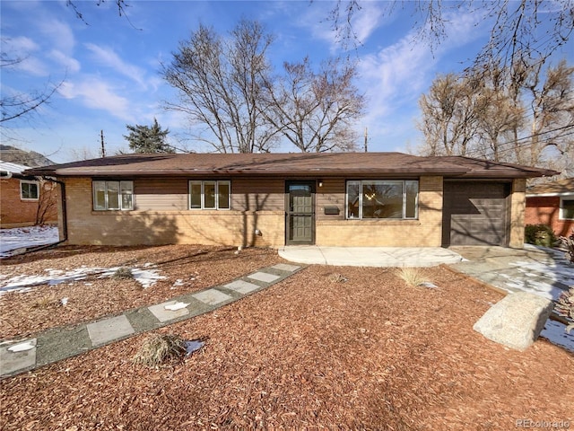 ranch-style home with a garage