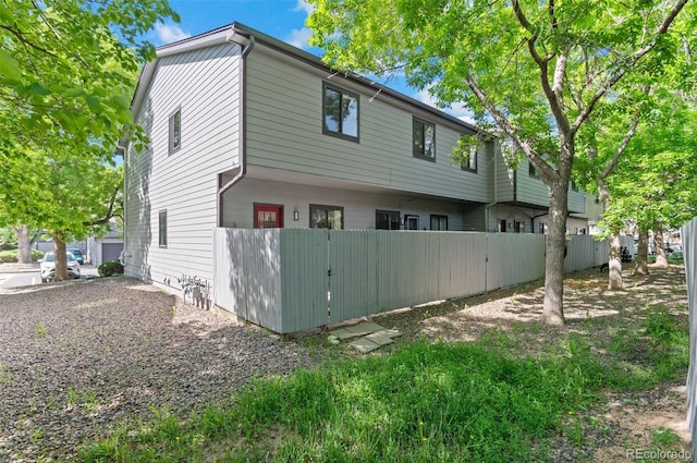 10693 W 63rd Dr Unit 106, Arvada, CO 80004 - view of side of home featuring fence