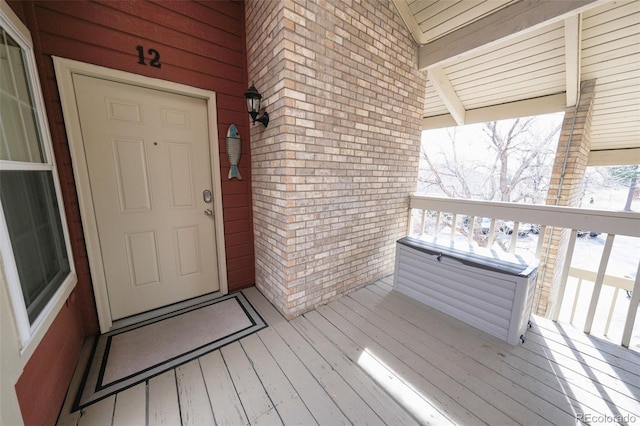 view of snow covered property entrance