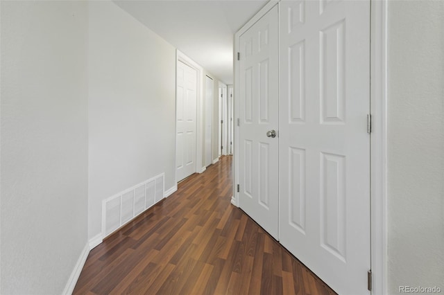 hall featuring dark hardwood / wood-style floors