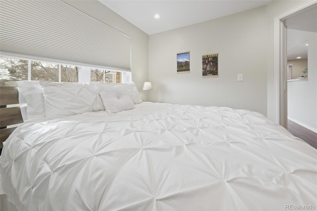 bedroom featuring multiple windows