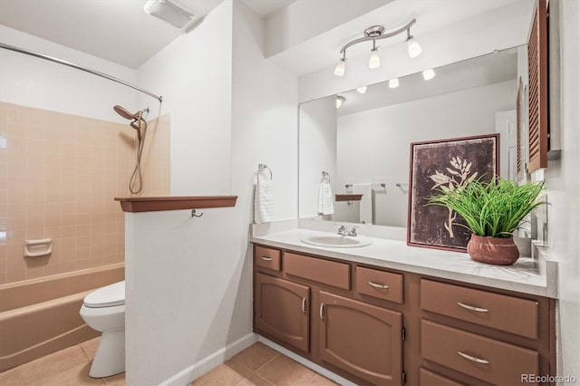 bathroom featuring shower / bathing tub combination, vanity, toilet, and tile patterned floors