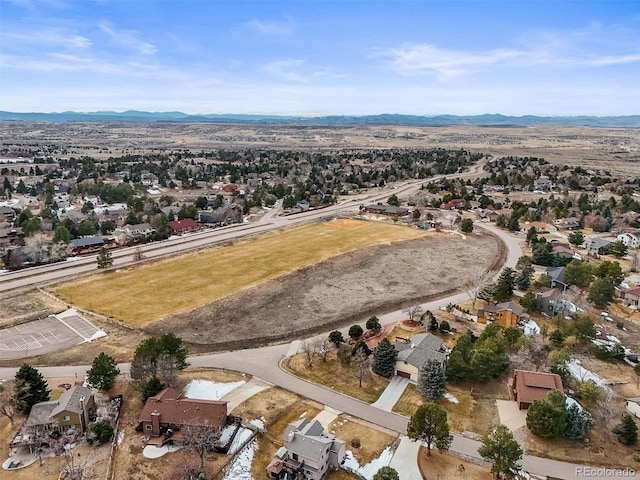 birds eye view of property featuring a residential view and a mountain view