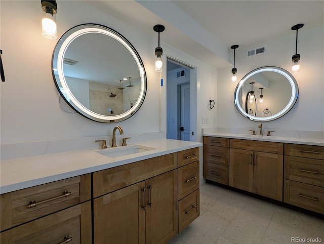 bathroom with vanity and walk in shower