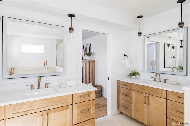 full bathroom featuring two vanities and a sink