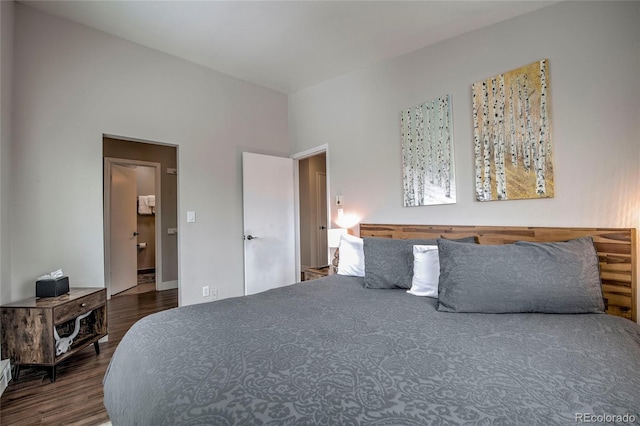 bedroom with wood finished floors