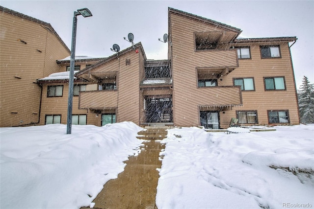view of snow covered building