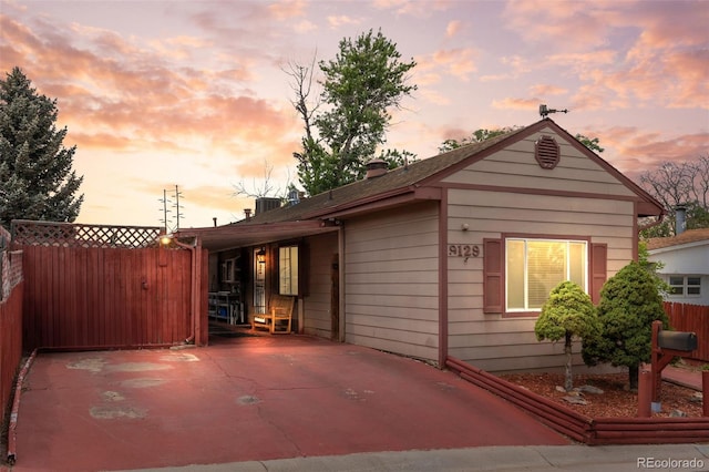 9129 Rampart St, Denver, CO 80260 - view of back of house at dusk