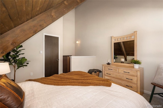 217 Van Anderson Dr Unit 6, Winter Park, CO 80482 - bedroom with wood ceiling, carpet flooring, and lofted ceiling with beams