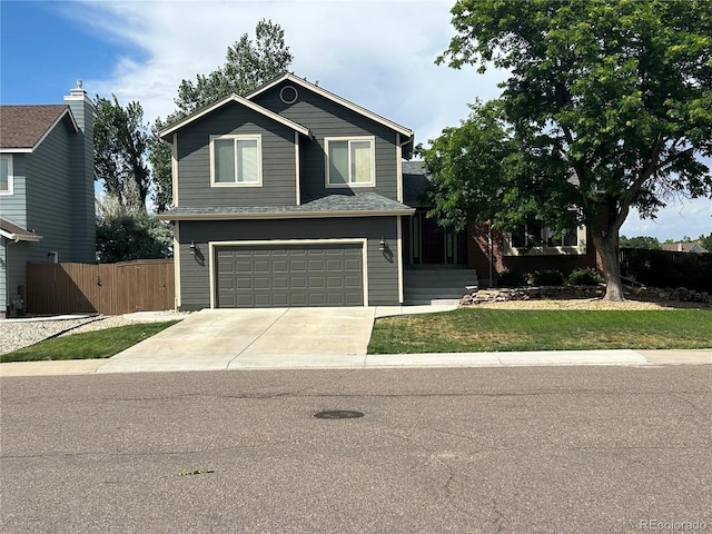 1495 Goldsmith Dr, Highlands Ranch, CO 80126 - view of front facade with driveway and a garage