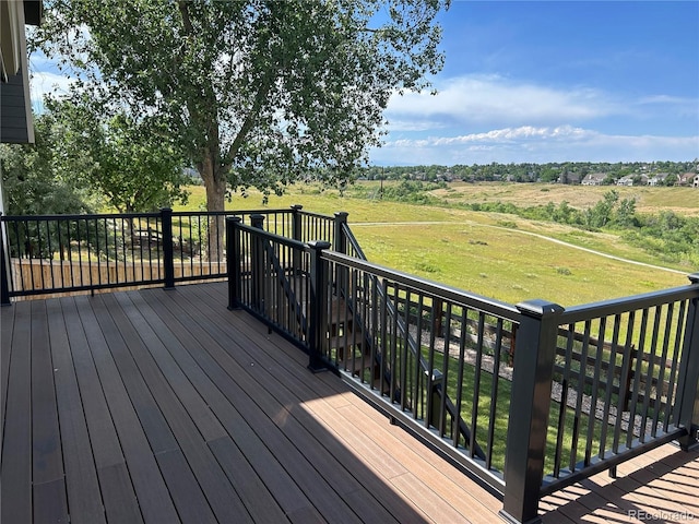1495 Goldsmith Dr, Highlands Ranch, CO 80126 - deck with a view of rural / pastoral area and a yard