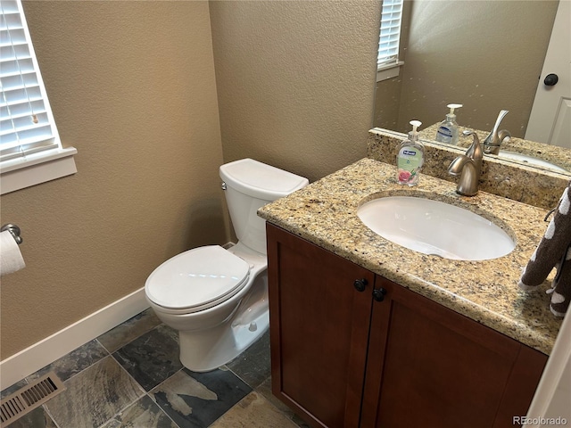 1495 Goldsmith Dr, Highlands Ranch, CO 80126 - bathroom featuring vanity and a textured wall
