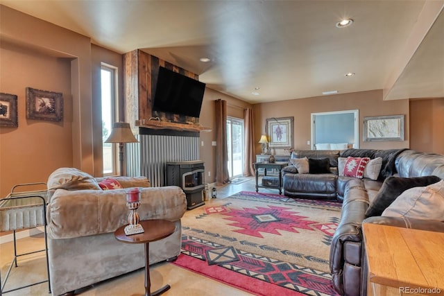 living room with a wood stove