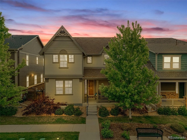 540 E Fremont Pl, Centennial, CO 80122 - view of front facade with a porch and a shingled roof