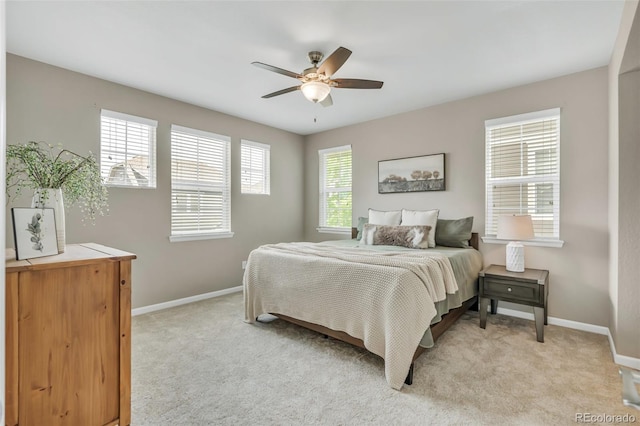 540 E Fremont Pl, Centennial, CO 80122 - bedroom featuring light colored carpet, baseboards, and a ceiling fan