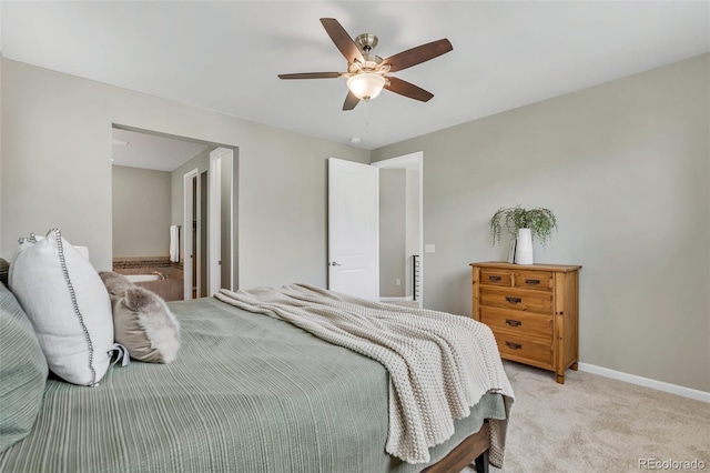 540 E Fremont Pl, Centennial, CO 80122 - bedroom featuring light colored carpet, baseboards, and a ceiling fan