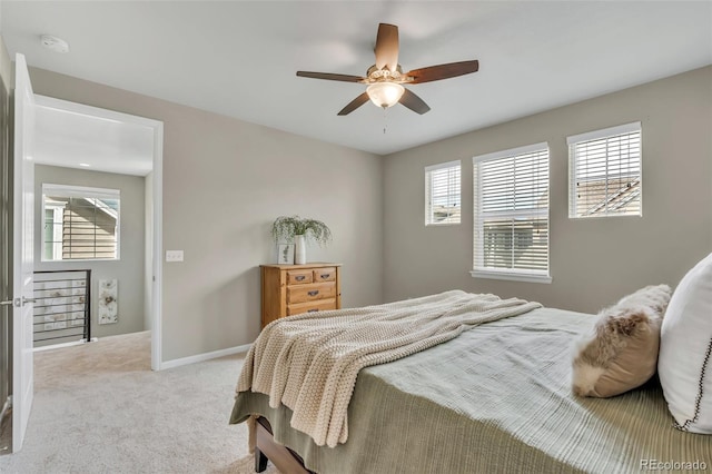 540 E Fremont Pl, Centennial, CO 80122 - carpeted bedroom with multiple windows, a ceiling fan, and baseboards