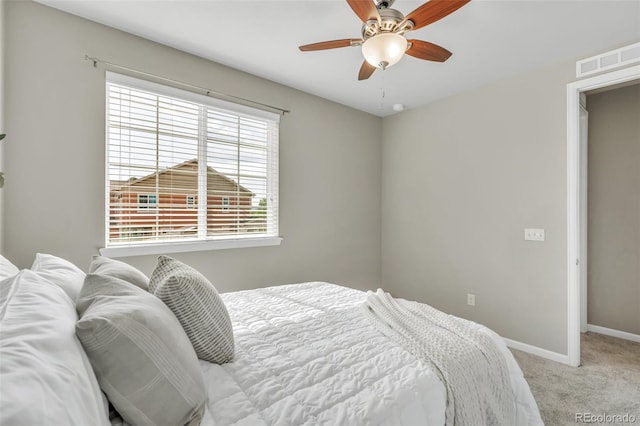 540 E Fremont Pl, Centennial, CO 80122 - bedroom featuring light carpet, baseboards, and ceiling fan