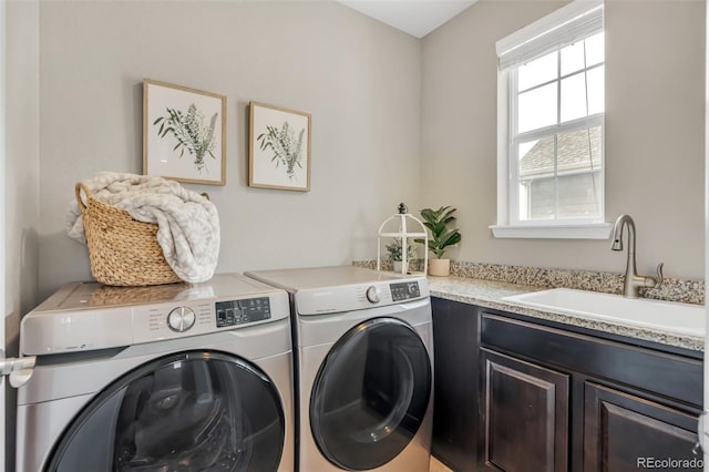 540 E Fremont Pl, Centennial, CO 80122 - laundry room featuring washer and dryer and cabinet space