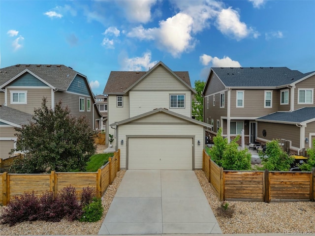 540 E Fremont Pl, Centennial, CO 80122 - view of front of property with a garage, a residential view, and concrete driveway