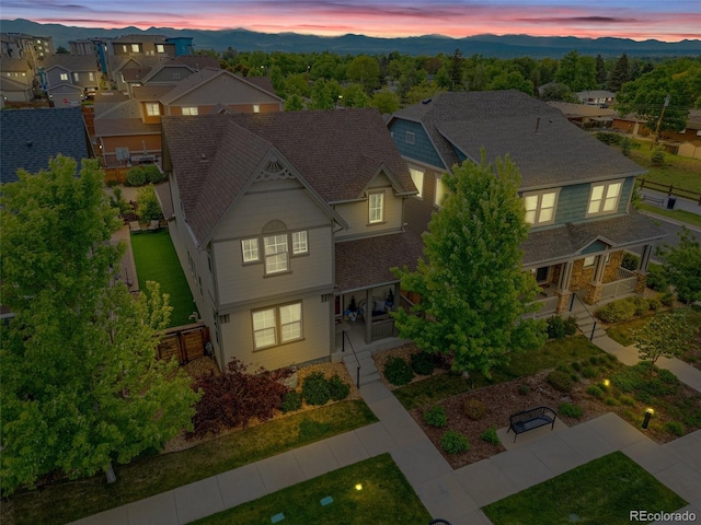 540 E Fremont Pl, Centennial, CO 80122 - aerial view at dusk of a residential view and a mountain view