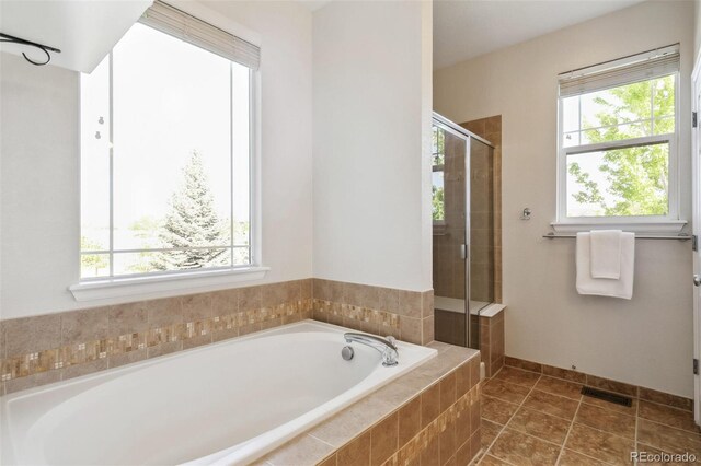 14247 W 84th Cir Unit A, Arvada, CO 80005 - bathroom with a bath and a shower stall