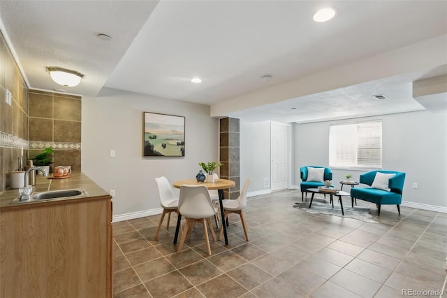 14247 W 84th Cir Unit A, Arvada, CO 80005 - dining space featuring dark tile patterned flooring and recessed lighting