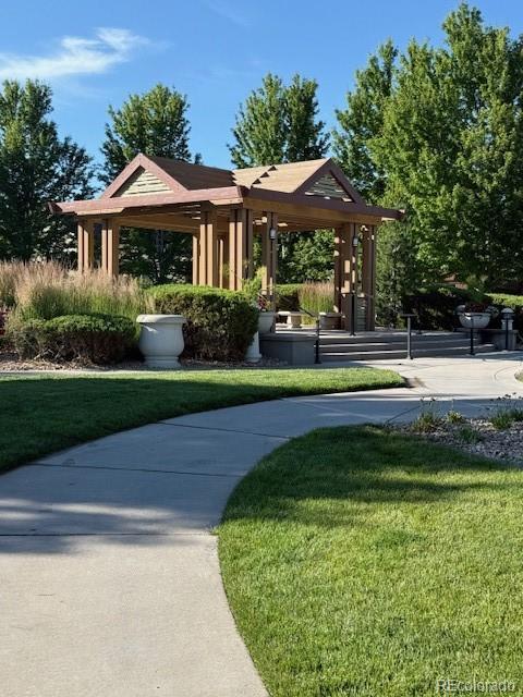 14247 W 84th Cir Unit A, Arvada, CO 80005 - view of property's community featuring a gazebo and a yard