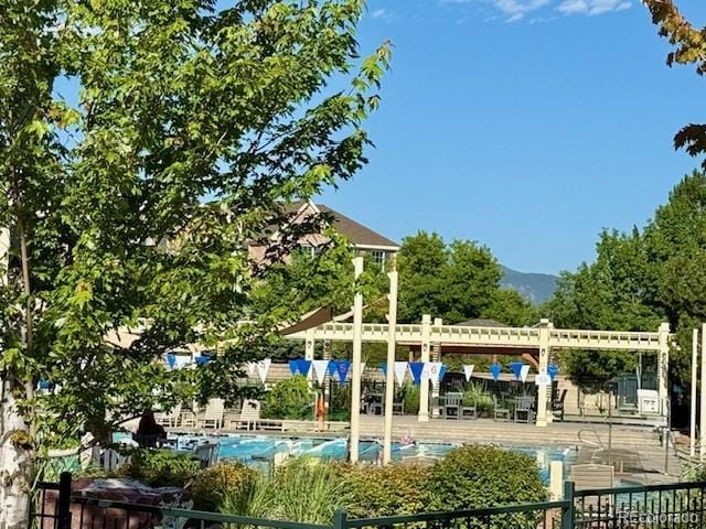 14247 W 84th Cir Unit A, Arvada, CO 80005 - view of home's community with a swimming pool