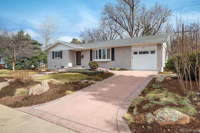 ranch-style house with brick siding, concrete driveway, and a garage