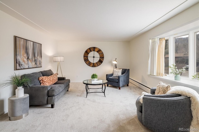 living room with a baseboard heating unit, baseboards, and light carpet