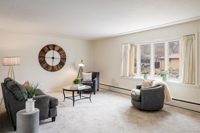 sitting room featuring a baseboard heating unit, light colored carpet, baseboards, and a baseboard radiator