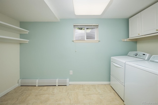 clothes washing area with baseboards, cabinet space, independent washer and dryer, and a baseboard radiator