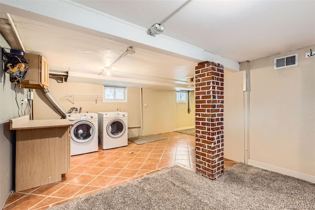 4057 Bryant St, Denver, CO 80211 - washroom with independent washer and dryer and light tile patterned floors