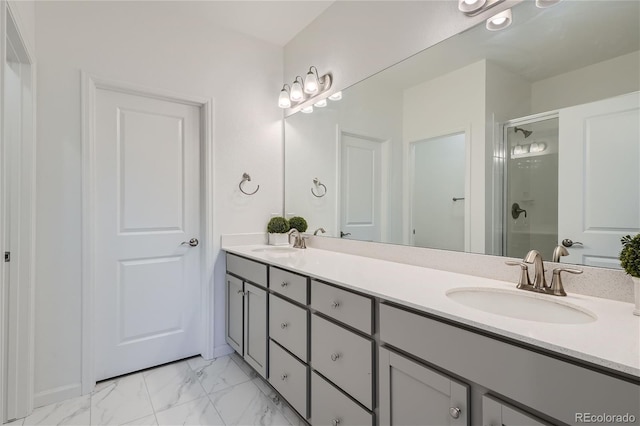 full bath featuring a shower with door, double vanity, and marble finish floors