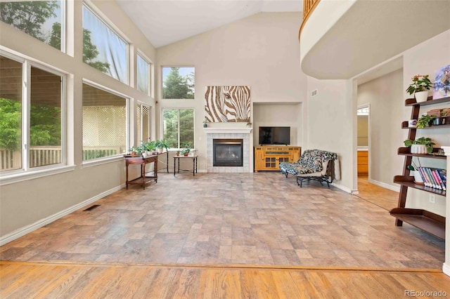 10170 E 151st Ct, Brighton, CO 80602 - sunroom / solarium with stone finish flooring, baseboards, and high vaulted ceiling