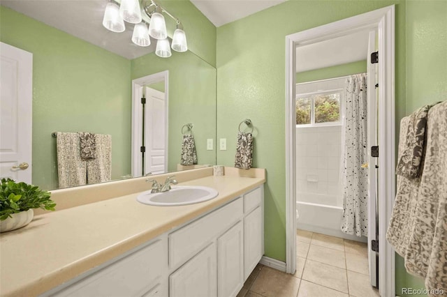 10170 E 151st Ct, Brighton, CO 80602 - full bath with vanity, a chandelier, tile patterned floors, shower / tub combo, and baseboards