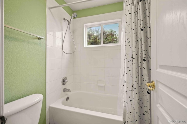 10170 E 151st Ct, Brighton, CO 80602 - full bathroom featuring a textured wall, shower / tub combo with curtain, and toilet