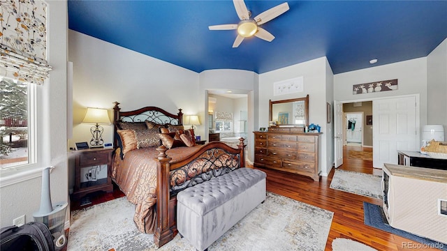 bedroom with a ceiling fan and wood finished floors