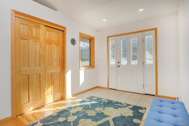 foyer with light tile patterned flooring